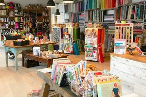 The shop floor of The Village Haberdashery in West Hampstead, full of fabrics, supplies and books for modern makers